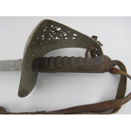 126 - Militaria: A Victorian British military sword. With wire bound fish skin grip and Henry Wilkinson of... 