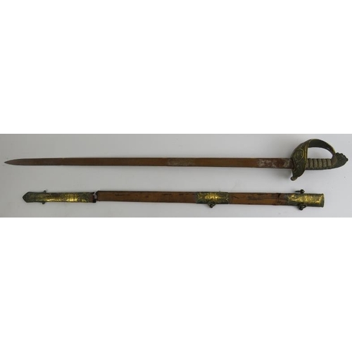 127 - Militaria: A British Naval military sword, 19th century. With wire bound shagreen grip, gilt metal g... 