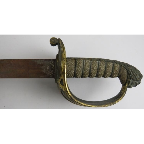 127 - Militaria: A British Naval military sword, 19th century. With wire bound shagreen grip, gilt metal g... 