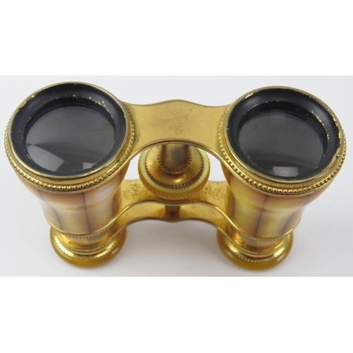 13 - A French pair of Lemaire Fabt of Paris gilt brass and yellow stained mother of pearl opera glasses, ... 