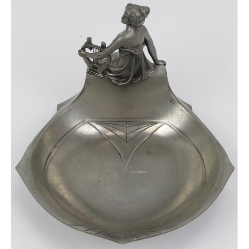 133 - An Art Nouveau pewter figural bowl, early 20th century. Struck with an angel symbol beside letters A... 