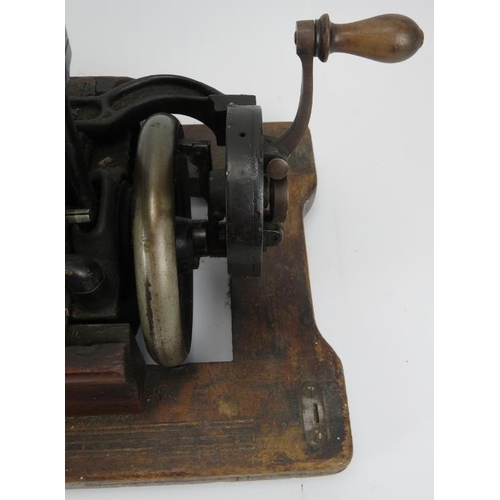 136 - A Victorian lever arm sewing machine, mid 19th century. Manufactured to be hired out to home workers... 