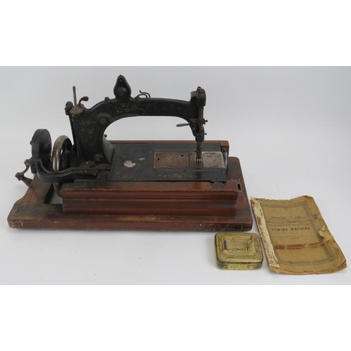 136 - A Victorian lever arm sewing machine, mid 19th century. Manufactured to be hired out to home workers... 