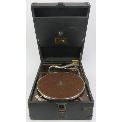 137 - A vintage His Masters Voice (HMV) portable picnic gramophone, circa 1930’s. With a disc holder to th... 