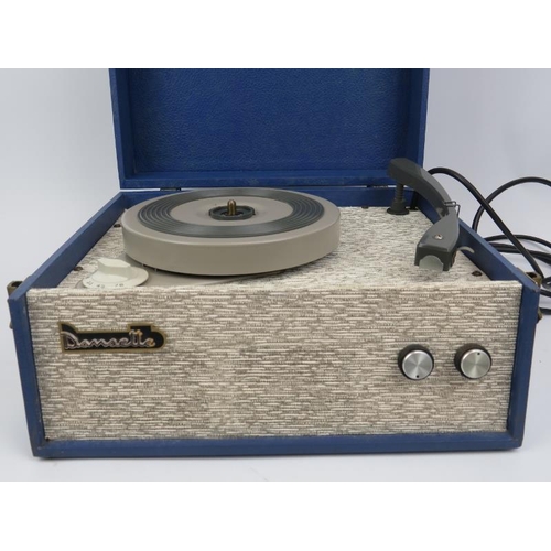 138 - A vintage Dansette ‘Popular’ model 16/33/45/78 speed portable record player, circa 1960’s. 34 cm wid... 