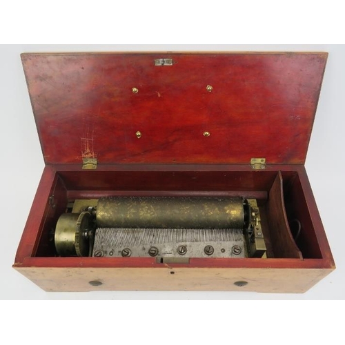 141 - An antique mechanical music box, late 19th/early 20th century. 38.2 cm length. 
Condition report: So... 