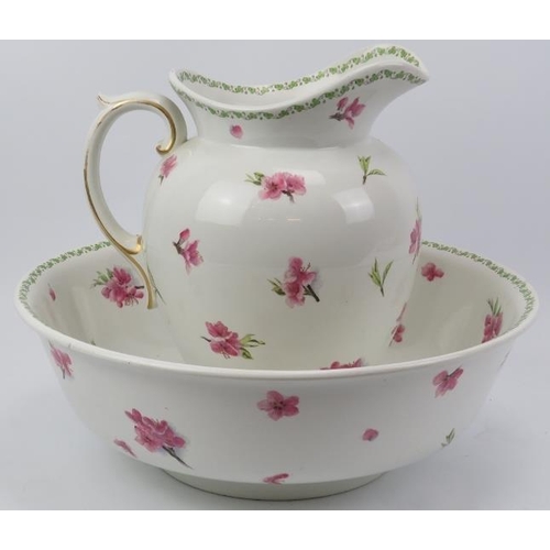 145 - A late Victorian George Jones and Sons ‘Crescent’ floral porcelain jug and wash basin bowl. (2 items... 