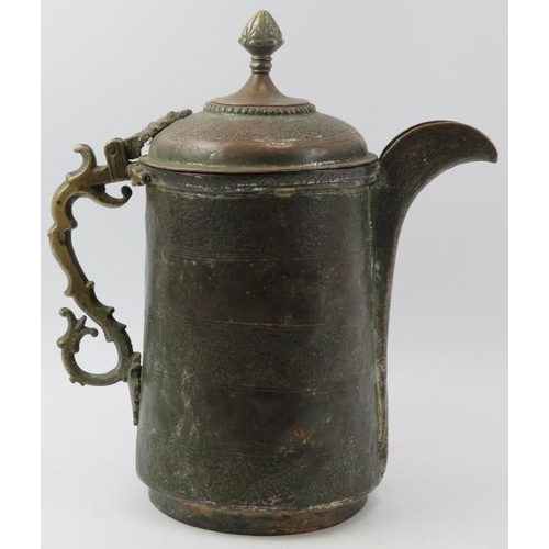 152 - An Indo-Persian metalwork lidded decanter jug with embossed decoration, 19th century. With a hinged ... 