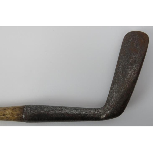 154 - A vintage hickory golf blade putter, early 20th century. Faint/indistinct mark, purported by the ven... 