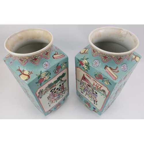 159 - A pair of Chinese famille rose vases, mid 20th century. Of square form with figural panels and symbo... 