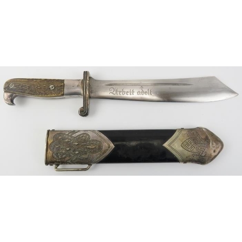 17 - A German Second World War Third Reich RAD enlisted man’s hewer. The fullered blade of scimitar style... 