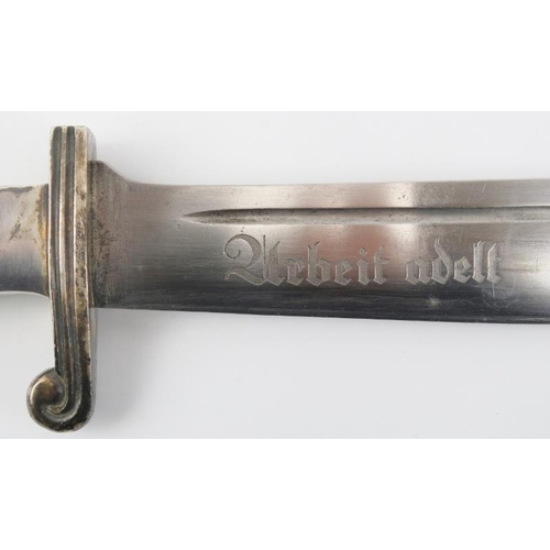 17 - A German Second World War Third Reich RAD enlisted man’s hewer. The fullered blade of scimitar style... 