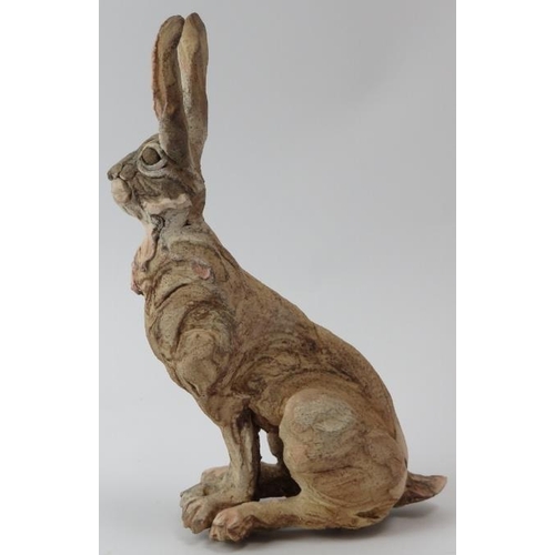 185 - Pierre Diamantopoulo (b.1952) - A studio pottery model of a seated hare. Incised signature and dated... 