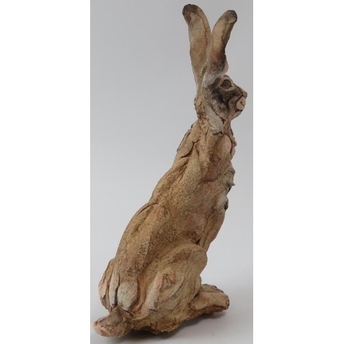 185 - Pierre Diamantopoulo (b.1952) - A studio pottery model of a seated hare. Incised signature and dated... 