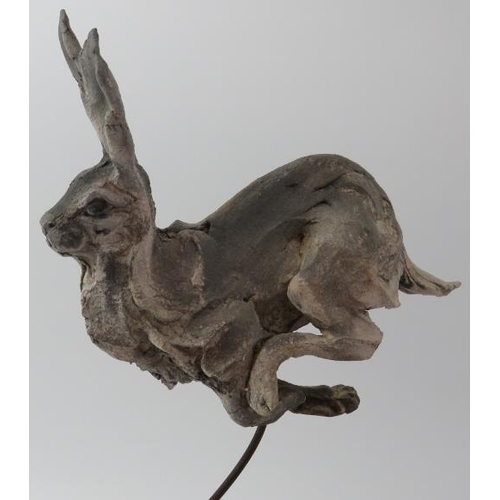 188 - Pierre Diamantopoulo (b.1952) - A studio pottery model of a running hare. Supported on a wire and sa... 