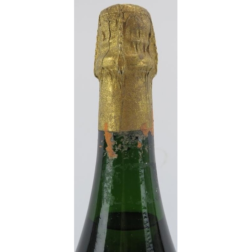 208 - A Magnum bottle of Veuve Clicquot Champagne, 1989. Level at mid neck, labelling badly worn and part ... 