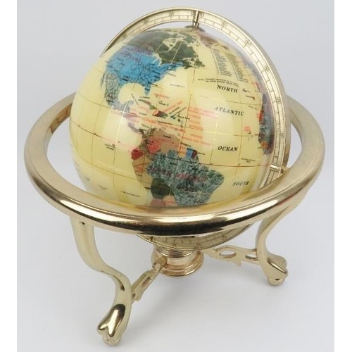 22 - A terrestrial globe inlaid with a variety of stones and abalone shell, late 20th century. The globe ... 