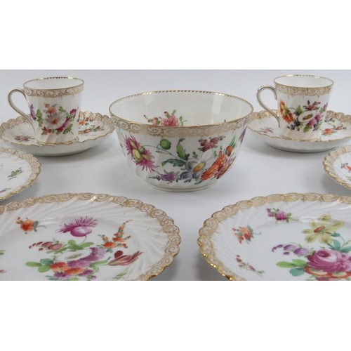 220 - A Dresden porcelain part tea service, 19th century. Comprising a sugar bowl, four teacups and saucer... 