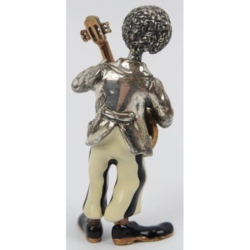 24 - An Italian Sorini enamelled and parcel gilt silver figure of a clown with banjo, 20th century. Struc... 