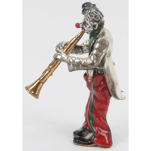 26 - An Italian Sorini enamelled and parcel gilt silver figure of a clown with soprano saxophone, 20th ce... 