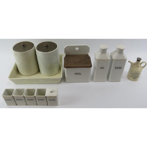 264 - A group of German white glazed and creamware ceramic kitchenalia and a Ruppel Geschützt ‘Petroleum’ ... 