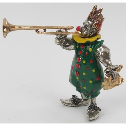 27 - An Italian Sorini enamelled and parcel gilt sterling silver figure of a clown with trombone, 20th ce... 