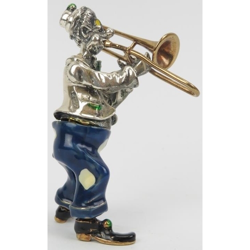 28 - An Italian Sorini enamelled and parcel gilt silver figure of a clown with trombone, 20th century. St... 