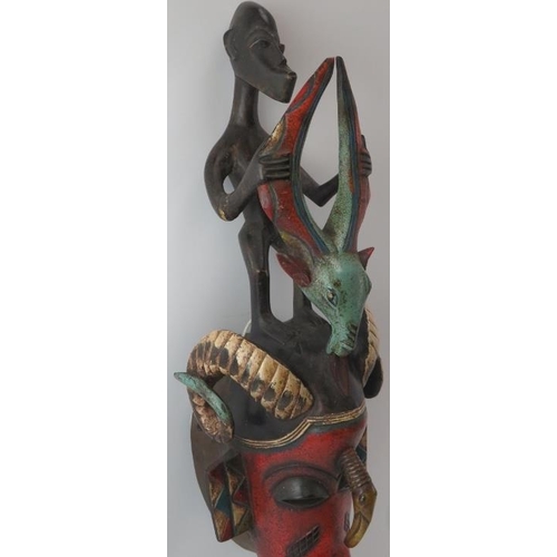 286 - Tribal Art: An African carved and painted wood mask, Baule (Baoulé) people, Cameroon. Depicted with ... 