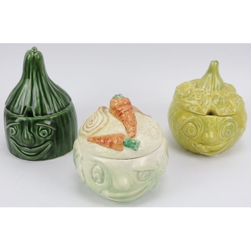 29 - A group of ten novelty Sylvac ceramic fruit and vegetable caricature condiment storage jars and cove... 