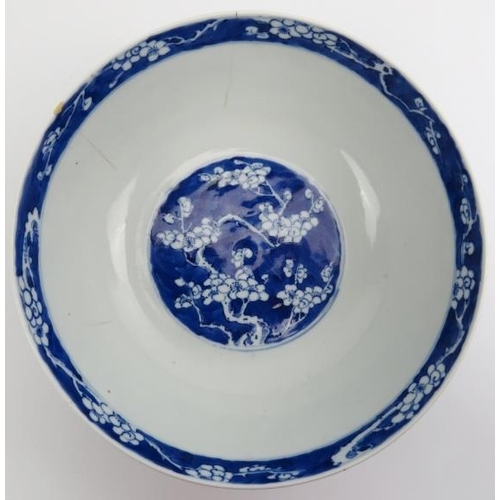 3 - A Chinese blue and white porcelain bowl, probably 19th century. Decorated with blossoming prunus. 22... 