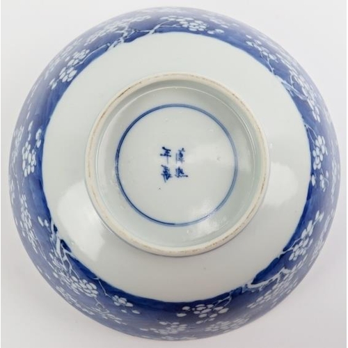 3 - A Chinese blue and white porcelain bowl, probably 19th century. Decorated with blossoming prunus. 22... 