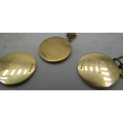 308 - A 10ct yellow gold medallion 'Scottsdale 1979' on a yellow metal rope chain necklace (clasp 9ct), an... 