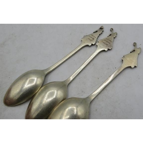 316 - A set of three silver teaspoons 'ACCRA Tennis Club' with tennis player finials, London 1934 & London... 