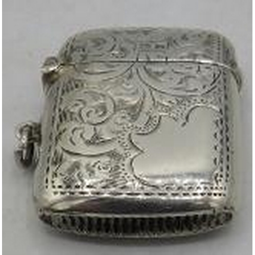 319 - A silver engraved vesta case with plain cartouche, Birmingham 1919. Approx weight 0.58 troy oz/18 gr... 