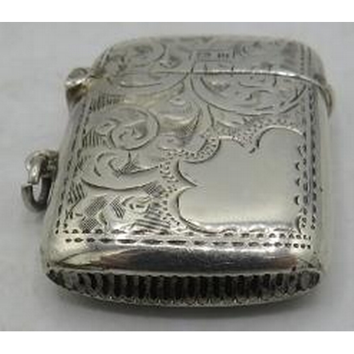 319 - A silver engraved vesta case with plain cartouche, Birmingham 1919. Approx weight 0.58 troy oz/18 gr... 