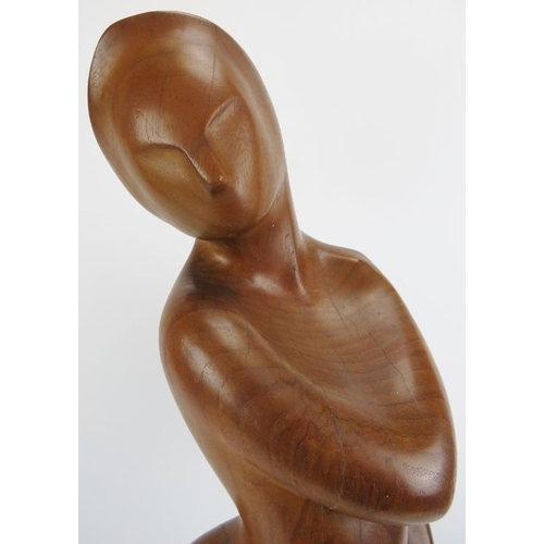 33 - An abstract carved wood sculpture of a female figure by Rothschild, dated 1980. Inscribed ’ROTHSCHIL... 