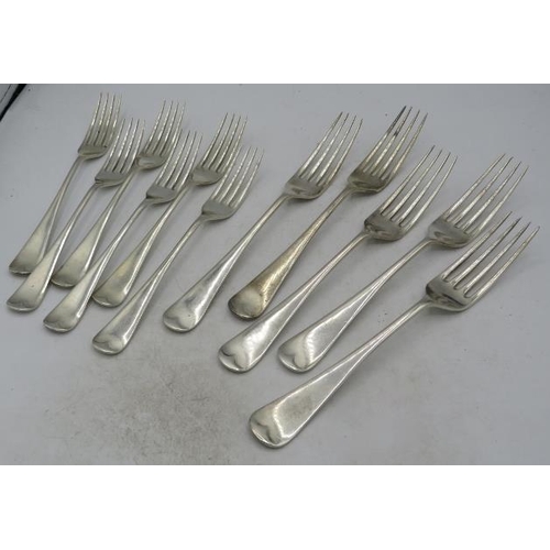 338 - A set of five silver table forks and six silver dessert forks, Sheffield 1914. Approx weight 19.5 tr... 