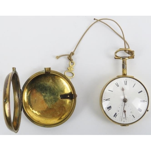 36 - A Georgian pair cased gilt metal pocket watch housed in a domed glass pocket watch stand. With a whi... 