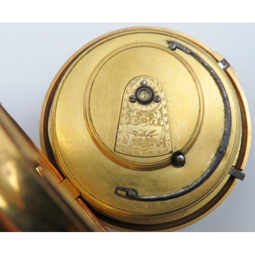 36 - A Georgian pair cased gilt metal pocket watch housed in a domed glass pocket watch stand. With a whi... 