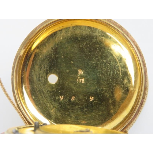 36 - A Georgian pair cased gilt metal pocket watch housed in a domed glass pocket watch stand. With a whi... 