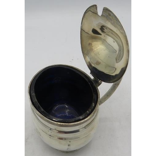 370 - A Georgian oval silver mustard pot with blue liner, London 1810, possibly Walker & Hall. Approx silv... 