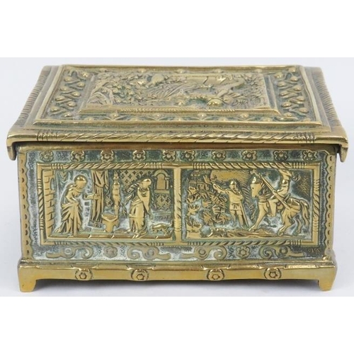 38 - A cast brass trinket jewellery box, 19th century. Decorated in shallow relief with figural panels to... 