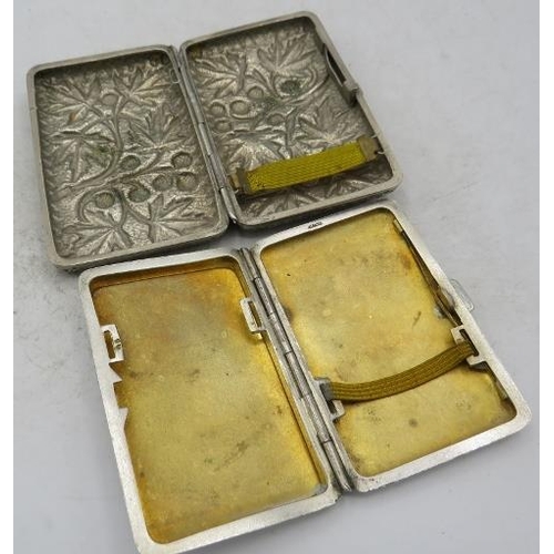 404 - Alpaca white metal cigarette case with black & white enamelling of 1950's lady going through a gale,... 