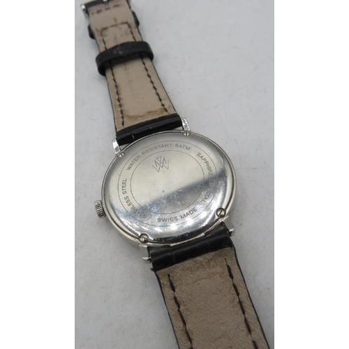 412 - A Mappin & Webb silver dial wristwatch on a black leather strap.
Condition report: Some wear to stra... 