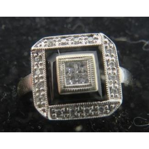 432 - An 18ct white gold & black enamel Art Deco style ring set with 4 brilliant cut diamonds in centre sq... 