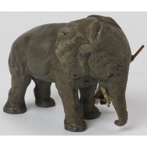 54 - A rare German cold painted lead figure of an Indian huntsman with elephant, early 20th century. Prob... 