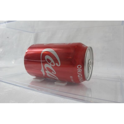 579 - Damien Hirst (British, b.1965) - Signed Coke can, displayed in a perspex case, 20cm long.
Provenance... 