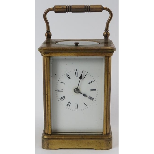 58 - A gilt brass carriage clock, late 19th/early 20th century. Housed within a black leather box. Windin... 