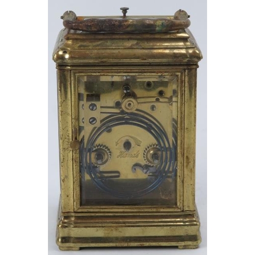 59 - A brass carriage clock retailed by West & Son Dublin, late 19th century. 12.7 cm height.
Condition r... 