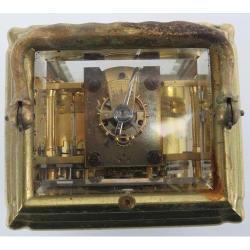 59 - A brass carriage clock retailed by West & Son Dublin, late 19th century. 12.7 cm height.
Condition r... 